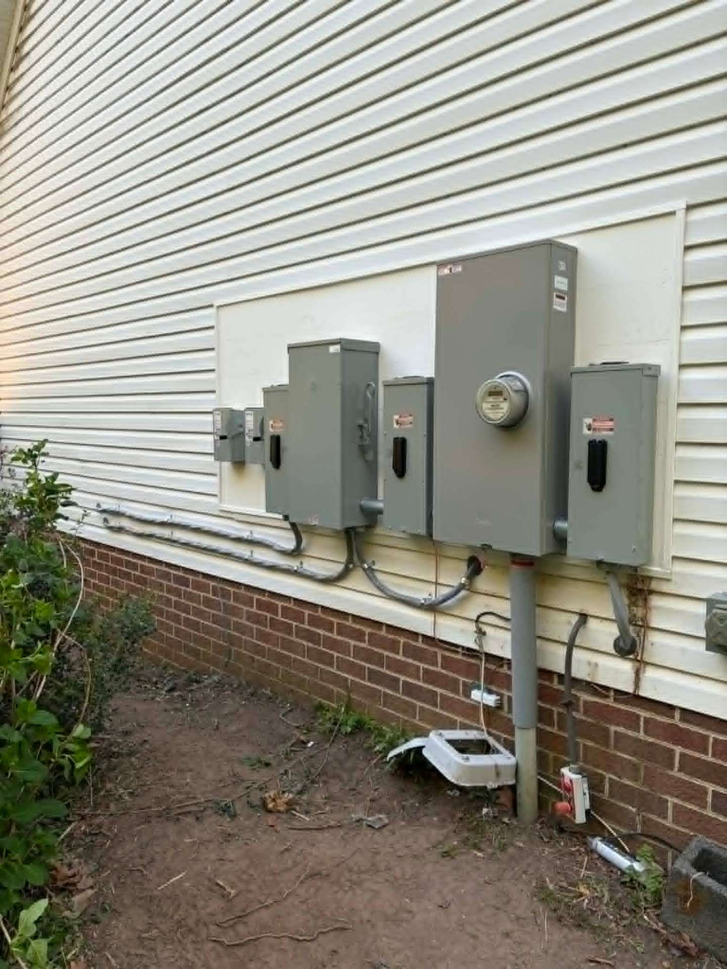 Detailed view of a multi-meter electrical service installation